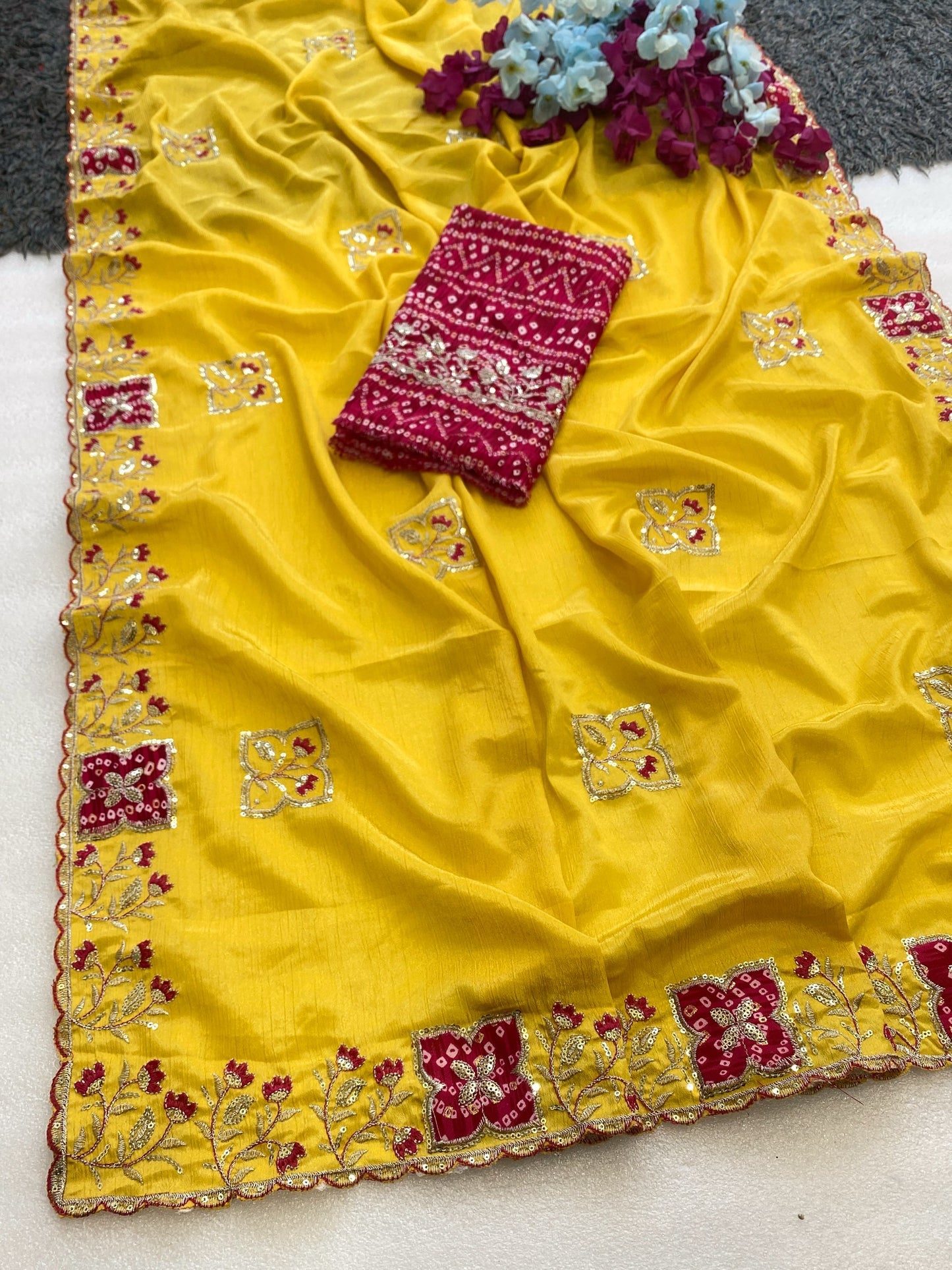 Elegance Premium Chinon Fabric Saree. Zari Embroidery Work With Sequence Work Designer Saree. The border also has rayon bandhani print butta With Beautiful Floral design. In All Over Saree