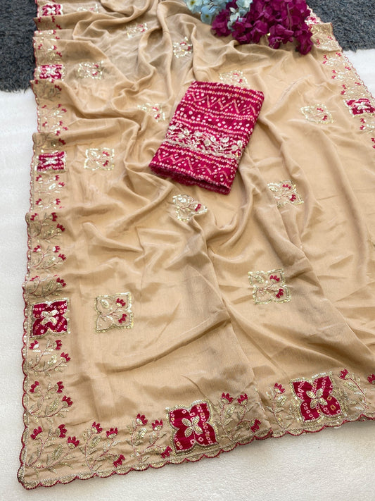 Elegance Premium Chinon Fabric Saree. Zari Embroidery Work With Sequence Work Designer Saree. The border also has rayon bandhani print butta With Beautiful Floral design. In All Over Saree