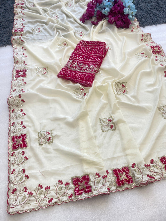 Elegance Premium Chinon Fabric Saree. Zari Embroidery Work With Sequence Work Designer Saree. The border also has rayon bandhani print butta With Beautiful Floral design. In All Over Saree