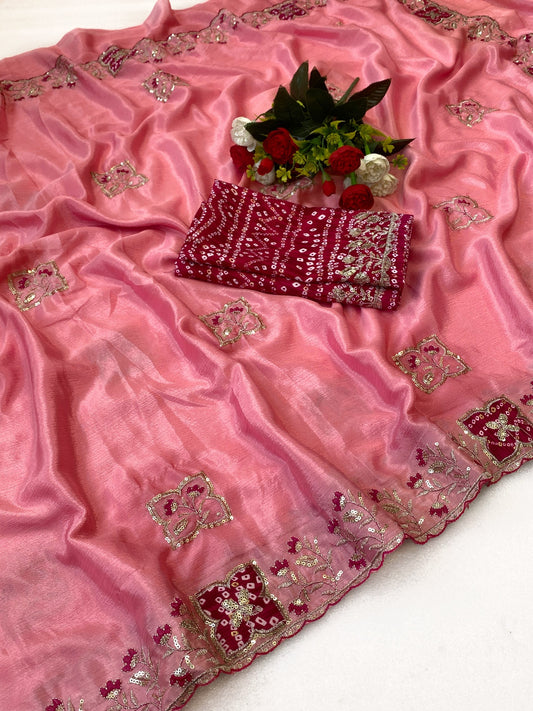 Elegance Premium Chinon Fabric Saree. Zari Embroidery Work With Sequence Work Designer Saree. The border also has rayon bandhani print butta With Beautiful Floral design. In All Over Saree