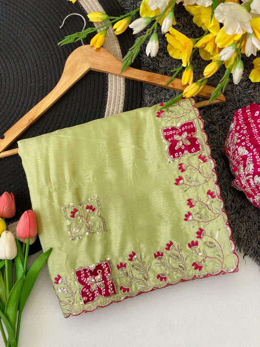 Elegance Premium Chinon Fabric Saree. Zari Embroidery Work With Sequence Work Designer Saree. The border also has rayon bandhani print butta With Beautiful Floral design. In All Over Saree