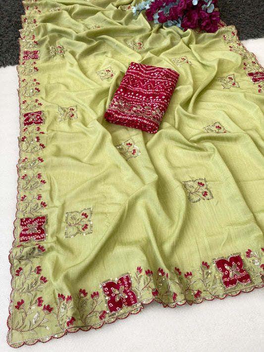 Elegance Premium Chinon Fabric Saree. Zari Embroidery Work With Sequence Work Designer Saree. The border also has rayon bandhani print butta With Beautiful Floral design. In All Over Saree